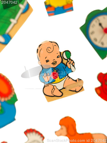 Image of Piece of an antique wooden puzzle for children