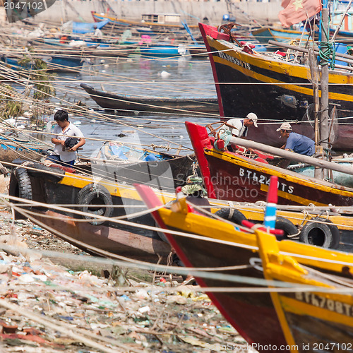 Image of PHAN THIET, VIETNAM, 25 JULY 2012; Fishing boats in a harbour in