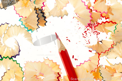 Image of Red pencil and wood shavings