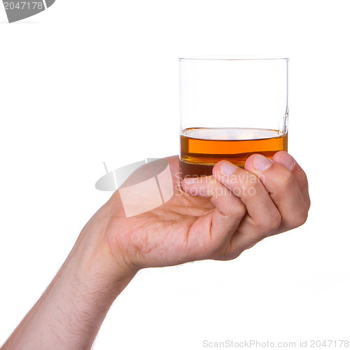 Image of Glass of whisky in hand