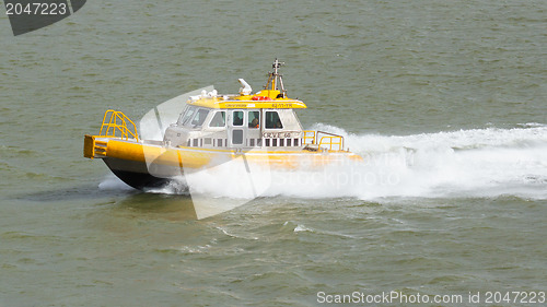 Image of Yellow Crewtender at high speed