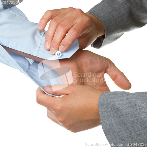 Image of Male getting ready, woman helping out