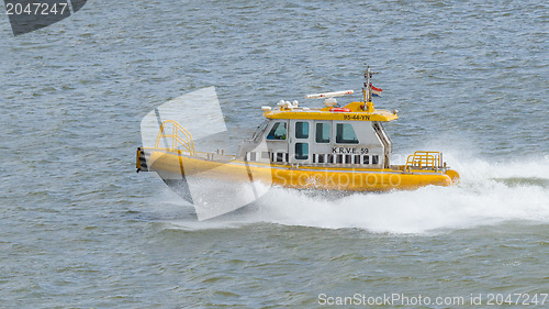 Image of Yellow Crewtender at high speed