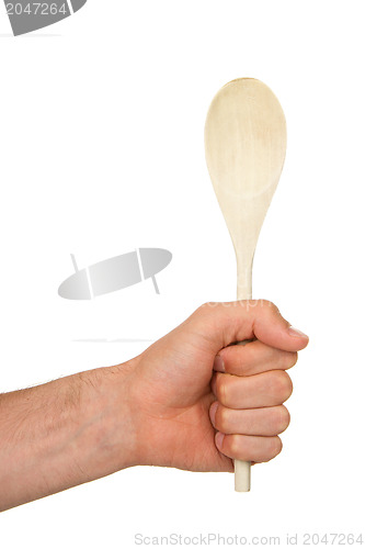 Image of Man holding a wooden spoon