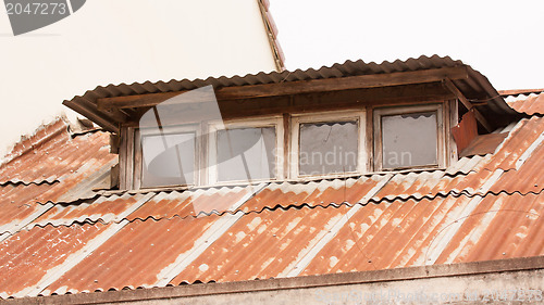 Image of Old galvanized roof covered in rust