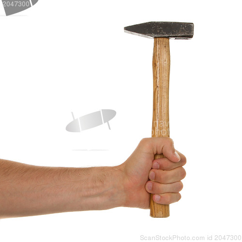 Image of Man holding a old wooden hammer