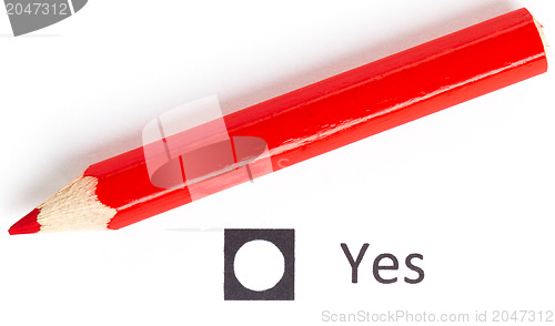 Image of Red pencil choosing between yes or no