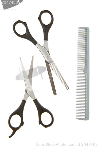 Image of Hair cutting shears and comb