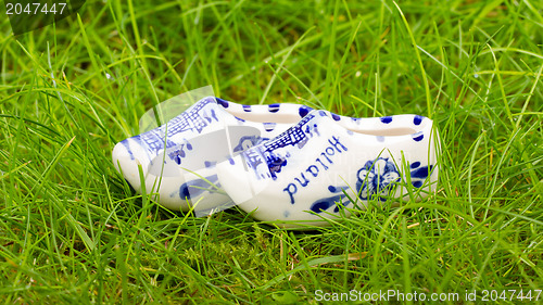 Image of Pair of small porcelain clogs from Holland