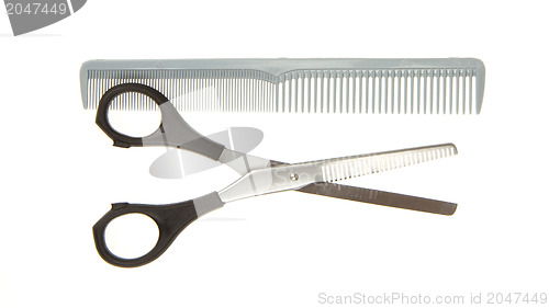 Image of Hair cutting shears and comb