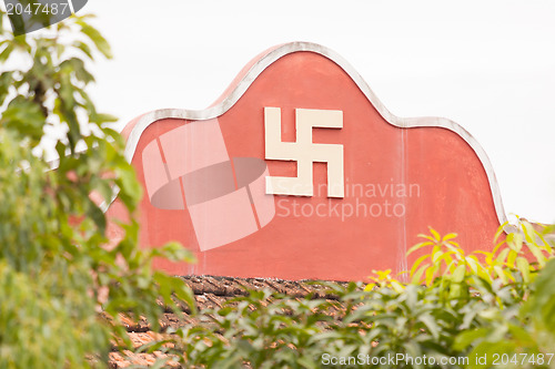 Image of Swastika symbol on top of a temple