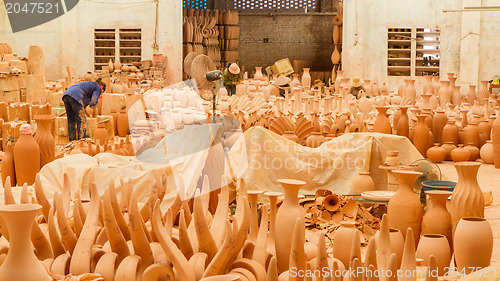 Image of HALONG, VIETNAM, 9 AUGUST 2012; Pottery waiting to be sold at a 
