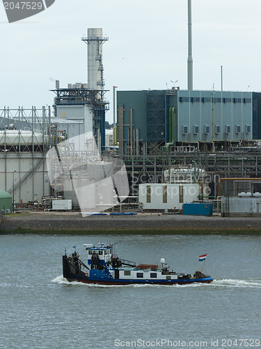 Image of Pushing boat sailing in the port of Rotterdam (Holland)