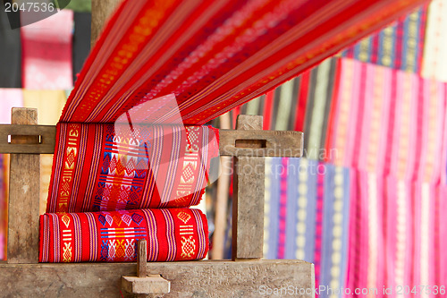 Image of Handmade silk textile industry, silk scarf on a old machine