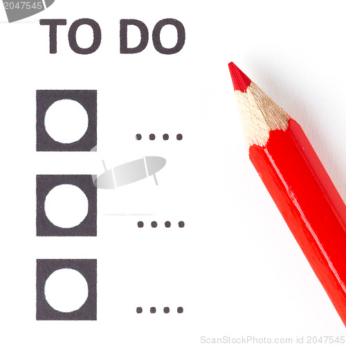 Image of Red pencil on a voting (to do) form