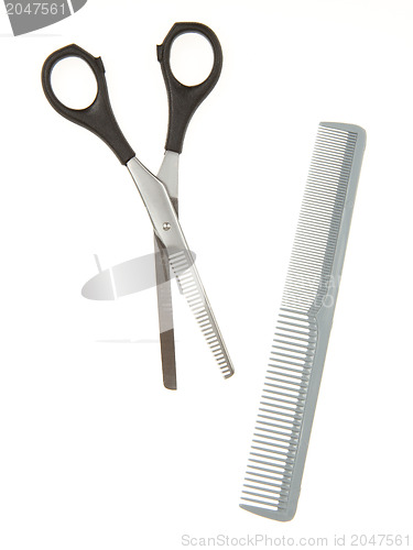 Image of Hair cutting shears and comb