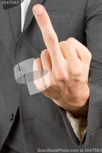 Image of Business man making a rude hand gesture