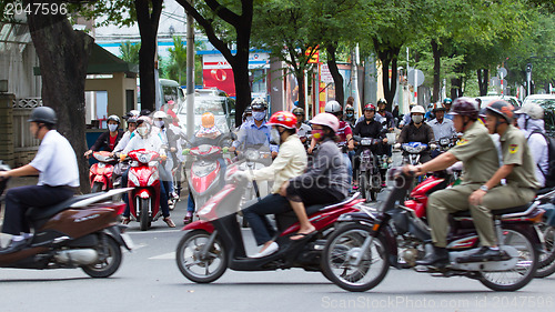 Image of SAIGON - JULY 23: A busy and congested road in Hanoi, Vietnam, J