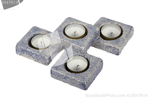Image of Candle-holder (pottery) or candlestick with four candles isolate