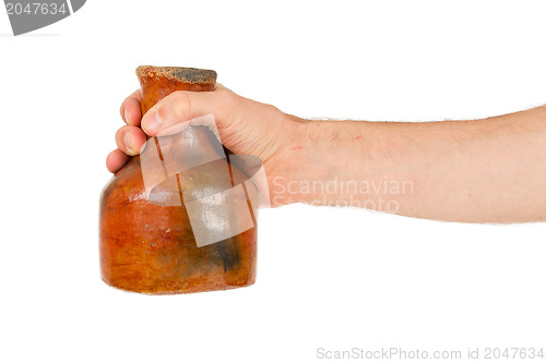 Image of Man holding old earthen bowl