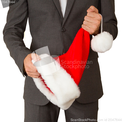 Image of Business man with a santa hat 