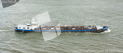 Image of Small chemical tanker sailing in the port of Rotterdam (Holland)