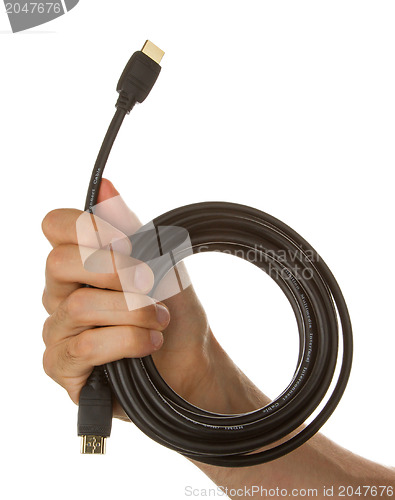 Image of Man holding a black hdmi cable