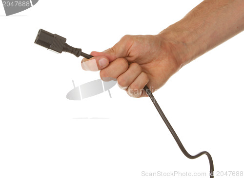 Image of Man is holding a black outlet in the hand isolated