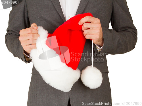 Image of Business man with a santa hat 