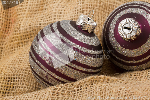 Image of Two purple Christmas balls isolated