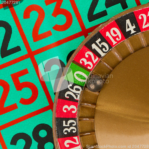 Image of Roulette table, wheel and ball