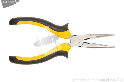 Image of Used yellow tool pliers isolated, rust and dust 