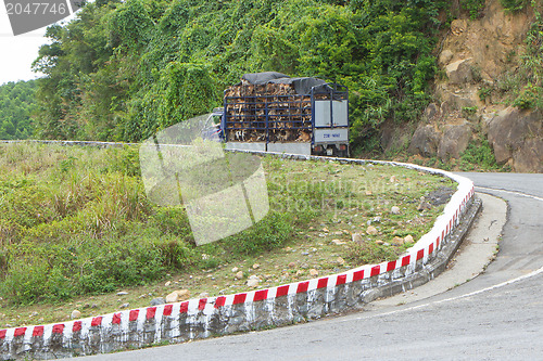 Image of HUE, VIETNAM - 4 AUGUST 2012: Trailer filled with live dogs dest