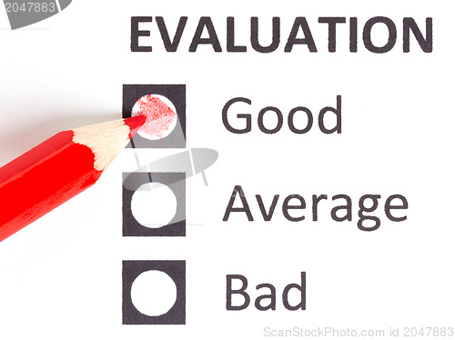 Image of Red pencil on a evaluationform