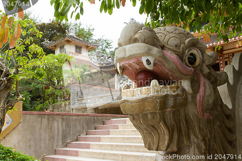 Image of Chinese dragon ornament on a stairs