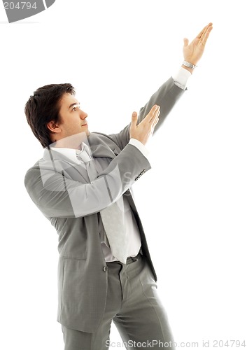 Image of businessman showing imaginary product #2