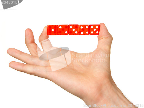 Image of Man holding five red dice