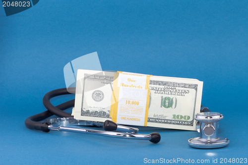 Image of stethoscope and dollars
