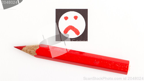 Image of Red pencil choosing the right mood, like or unlike/dislike 