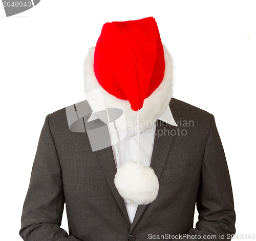 Image of Business man with a santa hat 