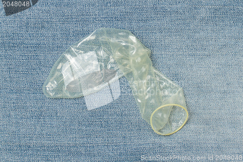 Image of Condom on jeans 