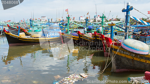 Image of Fishing boats in a harbour