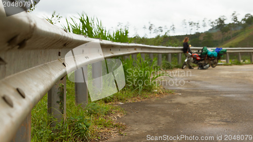 Image of Grey guardrail on a rural roadside with a nice perspective