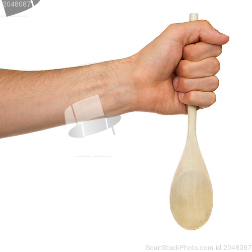 Image of Man holding a wooden spoon