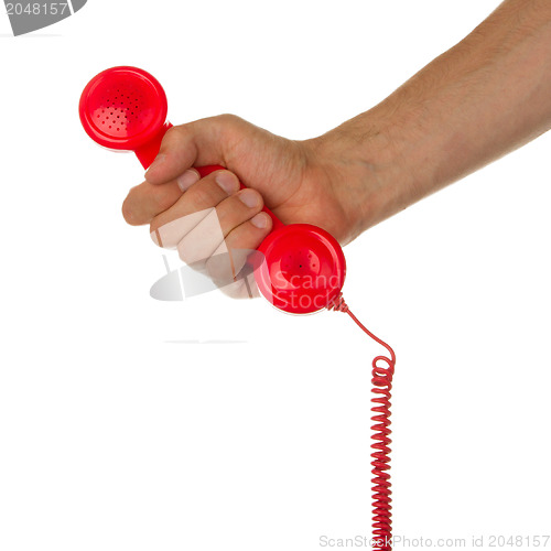 Image of Man holding a red telephone