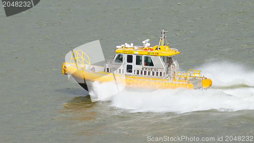 Image of Yellow Crewtender at high speed