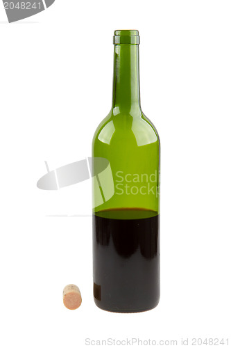 Image of Half empty red wine bottle 