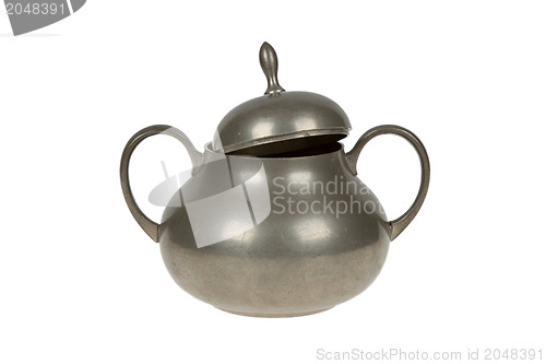 Image of Very old tin sugar pot full of scratches