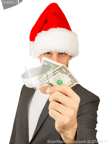 Image of Business man with a santa hat, santa's crisis budget