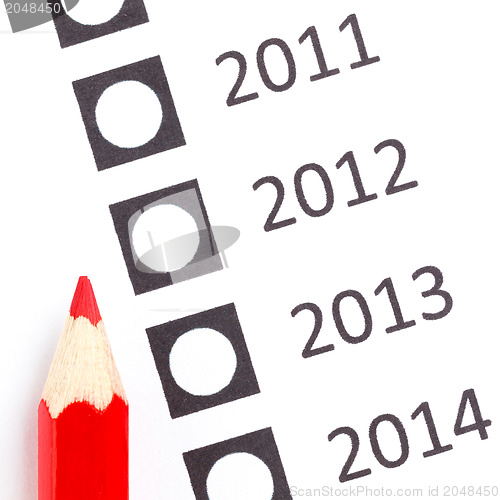 Image of Red pencil choosing a date 